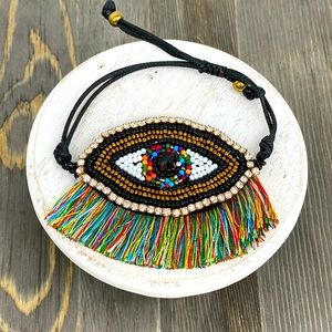 Spirit eye beaded felt bracelet with rainbow fringe